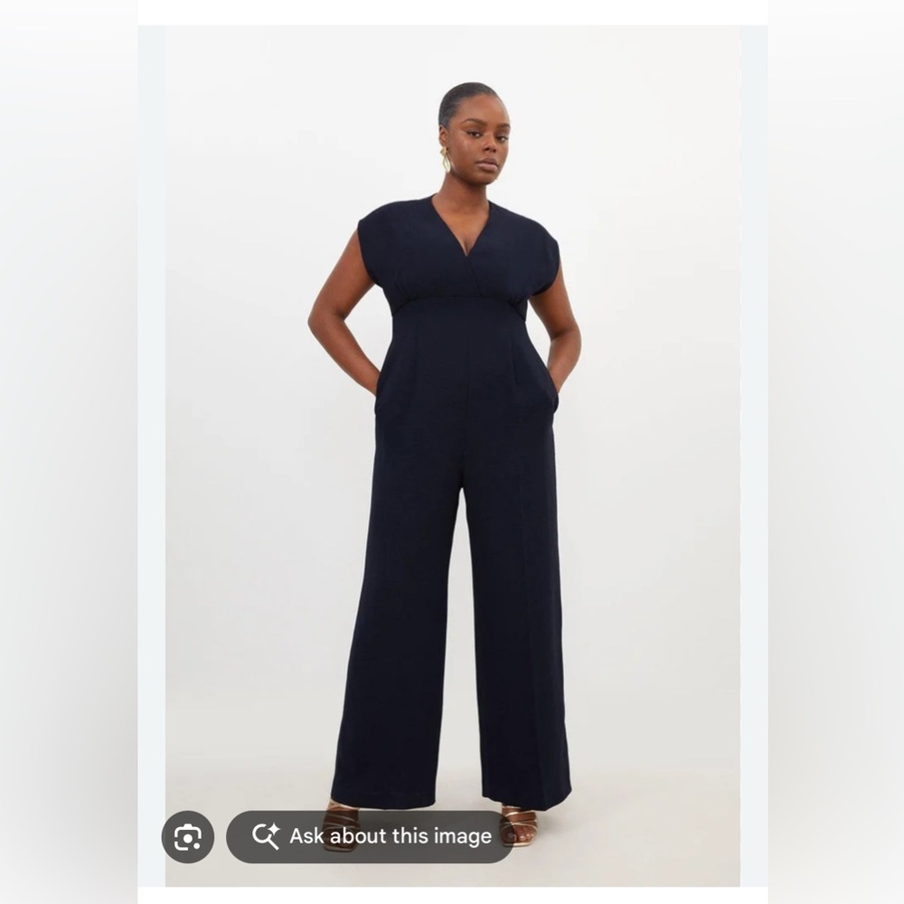 Kohls black jumpsuit size 12 with zipper up the back .
